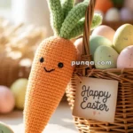 A crochet carrot with a smiling face is leaning against a wicker basket filled with painted Easter eggs. A small card on the basket reads "Happy Easter."