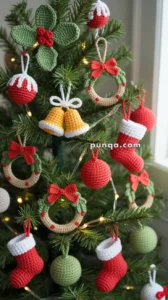 Christmas tree decorated with crocheted ornaments including wreaths, stockings, bells, and baubles in red, green, and white.
